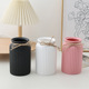 Vertical cream bottle